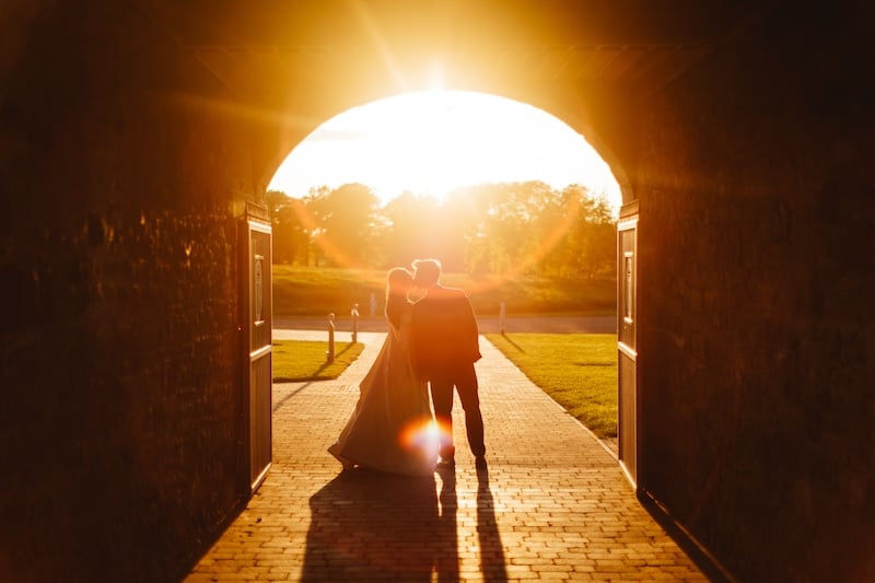 Couple celebrating their barn wedding in Rosebery Steading courtyard