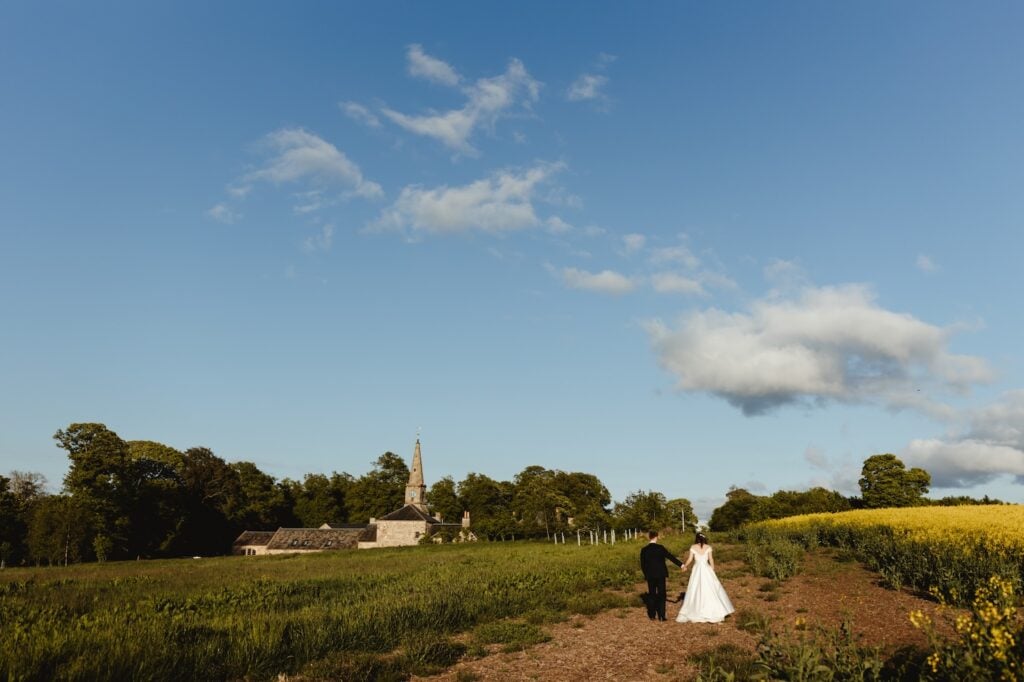 Couple celebrating their barn wedding at Rosebery Steading